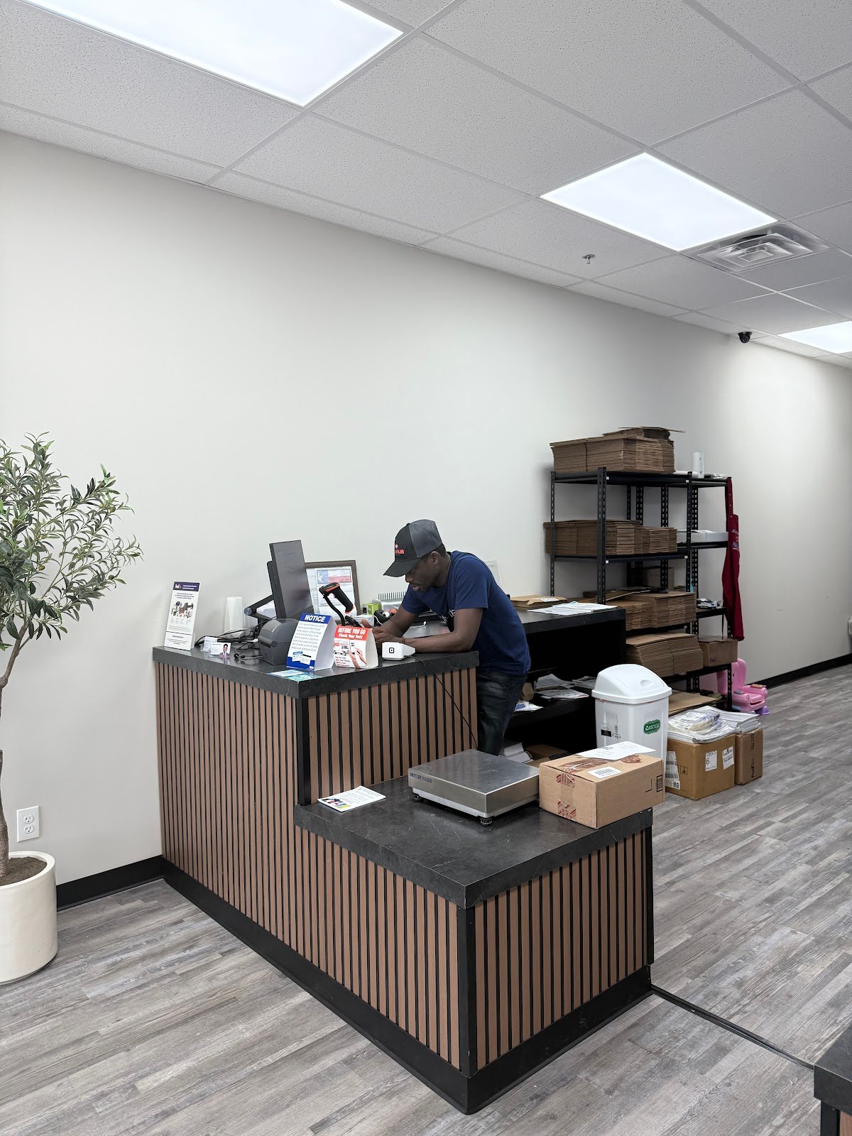 Mail Hub Iowa Colony service counter